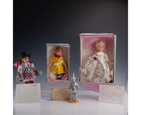 Charming 4-piece collection of Madame Alexander dolls, featuring a variety of characters and themes. Included is the 1999 lim