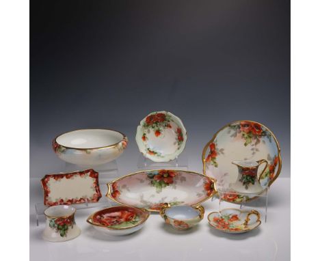 A 10 piece hand painted porcelain tableware set, each piece adorned with vivid red and orange poppy floral motifs accented wi