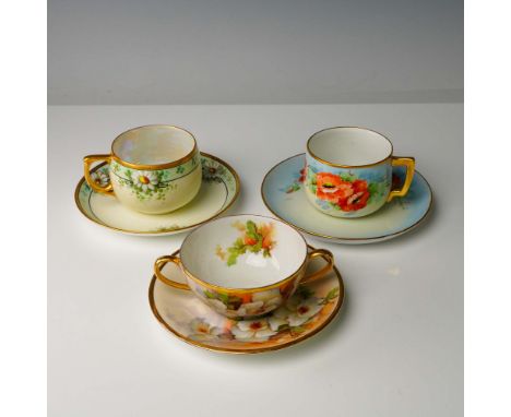 This 6-piece set features three hand-painted porcelain cups with matching saucers, each adorned with floral motifs and finish
