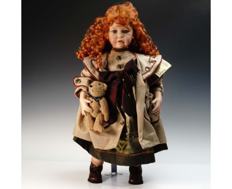 Charming limited edition porcelain doll from the Signature Series Collection. This hand painted Connoisseur Collection doll f