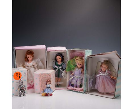 Assortment of six Madame Alexander collectible dolls with original boxes and tags, including a characters from Wizard of Oz a
