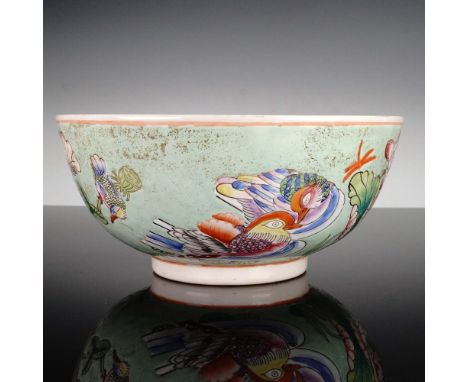 A finely enameled Chinese porcelain bowl, richly decorated in famille rose enamels with a pair of mandarin ducks among bloomi