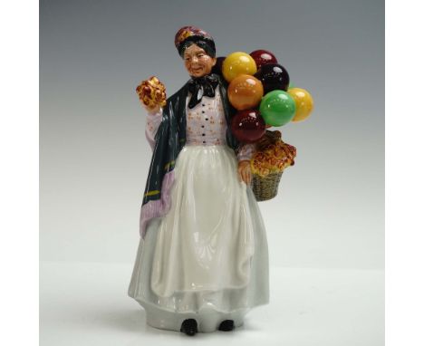 This Royal Doulton figurine, Biddy Pennyfarthing (HN 1843), presents a vibrant and nostalgic character from England's street-