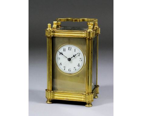 An early 20th Century French carriage timepiece, the 1.75ins diameter enamel dial with Arabic numerals within plain matted gi