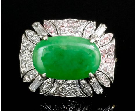 A modern silvery coloured metal mounted and jadeite and diamond brooch, the face set with an oval cabochon cut jadeite panel,