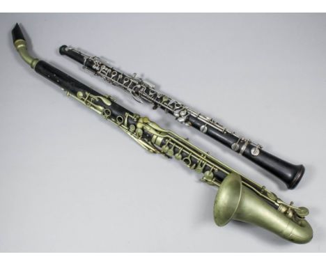 A Hawkes & Son of Denmark Street, London, "Excelsior, Sonorous Class" rosewood alto clarinet, 32ins overall (each section sta