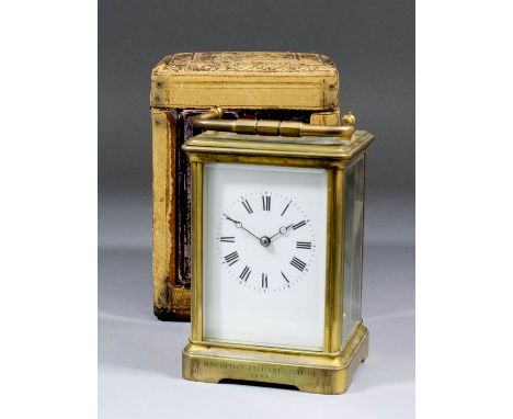 A late 19th Century French carriage clock by G.L., the white enamelled dial with Roman numerals to the eight day two train mo