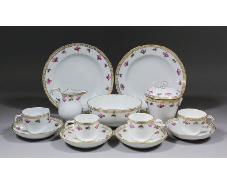 A late 19th Century Meissen porcelain part tea service painted with full blown pink roses and gilt (teapot missing - 77 piece