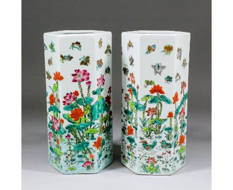 A pair of Chinese porcelain  hexagonal vases enamelled ("Famille Verte") with waterlilies and butterflies in the Kangxi manne