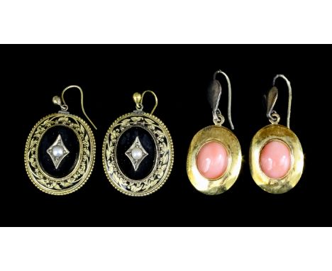A pair of late Victorian gold coloured metal, onyx and seed pearl set pendant drop earrings (for pierced ears), the central o