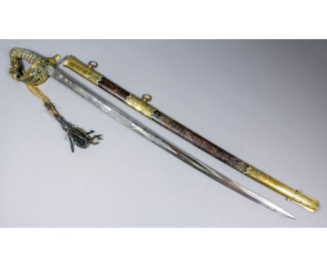 A 1827 pattern Naval Officer's dress sword, the 27ins blade etched with a lion and an anchor, bearing maker's name of C. Webb