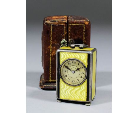An early 20th Century American silver and enamel miniature travelling timepiece retailed by Bigelow Kennard & Co, Boston, the