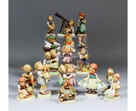 A collection of Hummel pottery figures, including - "Telling Her Secret", 5.5ins high, "Mother's Darling", 5.5ins high, "The 