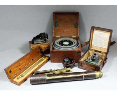 An early 20th Century leather covered brass single drawer telescope, 20ins overall, with canvas outer cover, a 20th Century s