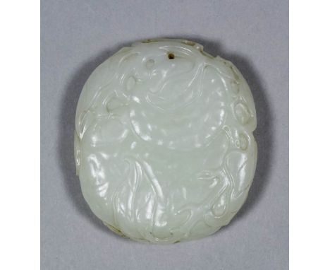 A Chinese white jade pendant, the surface to front and back finely carved with lychee, 51mm x 46mm overall x 12mm thick (Qing