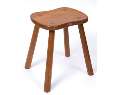 ROBERT THOMPSON OF KILBURN - MOUSEMAN STOOL an oak stool with a shaped top, supported on four tapering legs. Carved Mouse sig