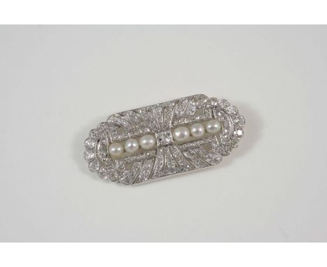 AN ART DECO DIAMOND AND PEARL BROOCH the openwork design is set with six untested pearls and is millegrain set overall with g