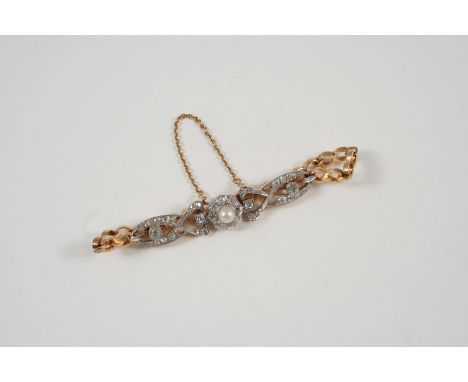 AN EARLY 20TH CENTURY DIAMOND BRACELET the central cluster is set with an untested pearl within a surround of old brilliant-c