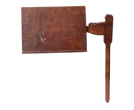 EARLY MOUSEMAN BOOK REST an oak adjustable book rest, originally part of a Mouseman reading chair. Carved Mouse signature. 