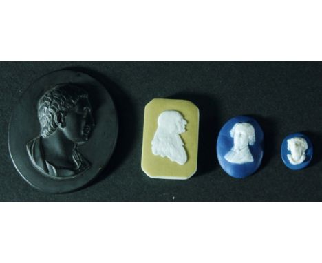 WEDGWOOD BLACK BASALT PORTRAIT MEDALLION, 19th century, of a classical male profile, impressed marks, 5cm x 4cm; together wit