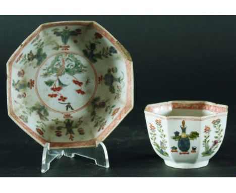 WORCESTER OCTAGONAL TEA BOWL AND SAUCER, ccirca 1755, with alternating panels of vases and sprays of flowers, the interior wi