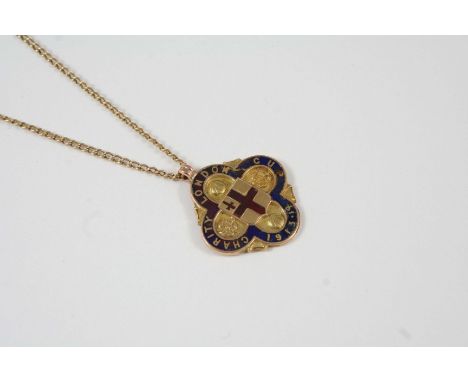 A 9CT. GOLD AND ENAMEL FOOTBALL CLUB MEDALLION with blue and red enamel decoration and inscribed to the front London Charity 