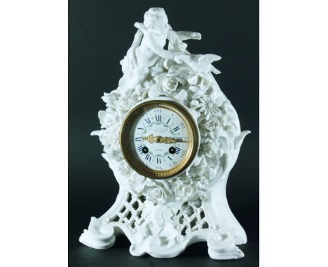 FRENCH PORCELAIN MANTEL CLOCK, circa 1900, the 3 1/3" enamelled dial inscribed Howell James & Co, London, To The Queen, on a 