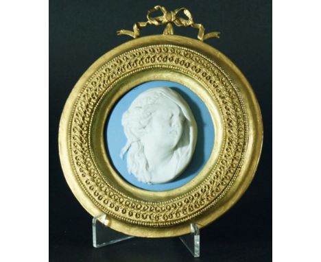 CLEOPATRA, A WEDGWOOD BLUE JASPER PORTRAIT MEDALLION, 19th century, in high relief, possibly after William Hackwood, incised 