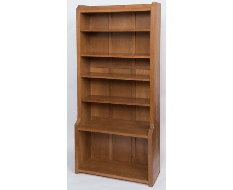 ROBERT THOMPSON OF KILBURN - MOUSEMAN BOOKCASE a tall bookcase with a panel back, with a fixed shelf and 4 adjustable shelves