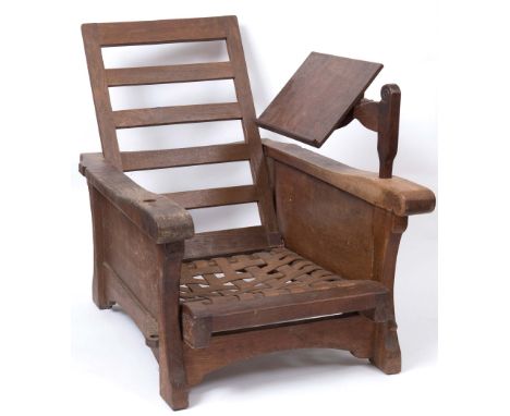 EARLY MOUSEMAN READING CHAIR - ROBERT THOMPSON OF KILBURN the chair with an adjustable back and leather strap work seat, with