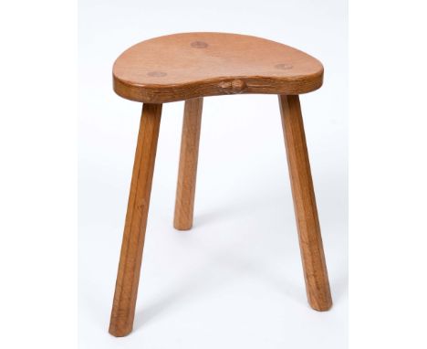 ROBERT THOMPSON OF KILBURN - MOUSEMAN STOOL an oak milking stool with 3 tapering legs, with a carved Mouse signature. 18ins (