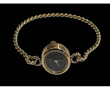 Roy King 9 carat gold vintage ladies twist bangle watch.