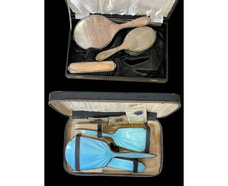Silver and blue enamel brush set, three Lucky Devon Pixies, and engine-turned silver brush set.