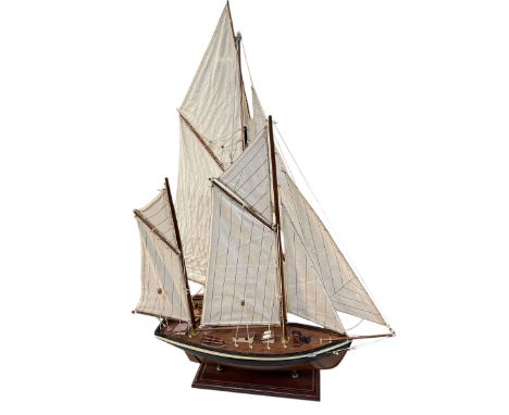 Two model ships on stands, figural two shade lamp and two other tables lamps.
