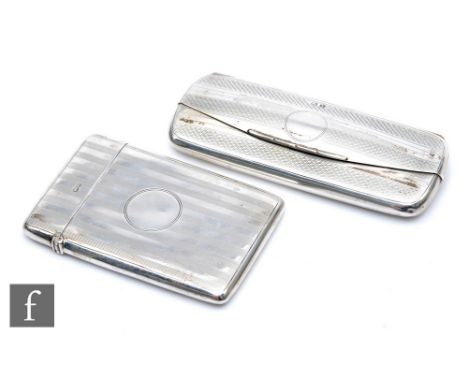 A hallmarked silver glasses case with engine turned decoration to the front, Birmingham 1923,&nbsp;Henry Williamson Ltd, toge