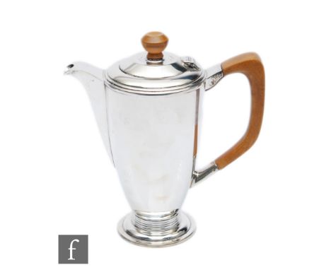 A hallmarked silver hot water pot of plain cylindrical tapering form, weight 13.5oz, terminating in wooden handle and button 