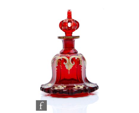 A 19th Century Bohemian Biedermeier crystal glass scent bottle circa 1850, cased in ruby over clear, the low shouldered, step