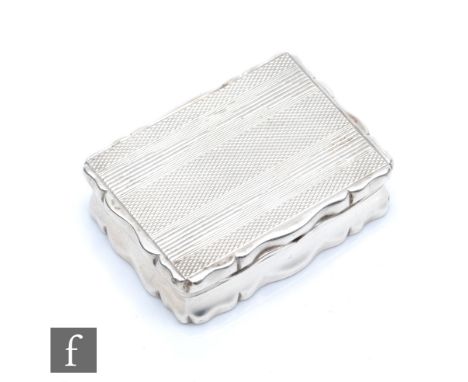 A George V hallmarked silver snuff box with engine turned decoration in the Art Deco style, the interior engraved ‘An Ode to 