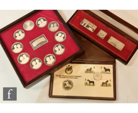 An Elizabeth II Sovereigns of Europe cased set of ten medallions with ingot, a cased set of three silver ingots Royal Standar