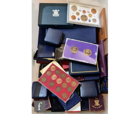 An Elizabeth II Diana Princess of Wales twelve coin Westminster portrait gilt coin set, also 2004 The Crown Jewels twelve cro