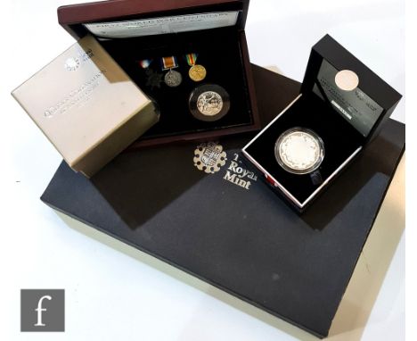 An Elizabeth II Royal Mint silver proof 2008 Royal Shield of Arms collection, cased with certificates, also First World War C