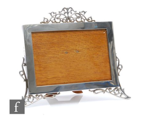 A George V hallmarked silver photograph frame, 12.5cm x 17.5cm, easel back, London 1913,&nbsp;Stokes &amp; Ireland Ltd, resto