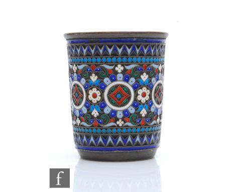 A Russian silver&nbsp;vodka cup decorated with cloisonne enamel decoration, weight 58g, height 6.5cm, marks to base, some dam