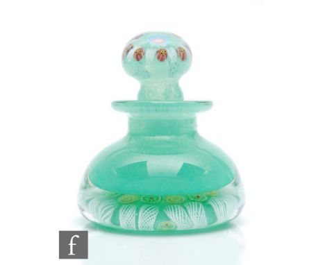 A 20th Century Ysart small glass inkwell, of domed form, internally decorated with a mottled green core and to the base mille