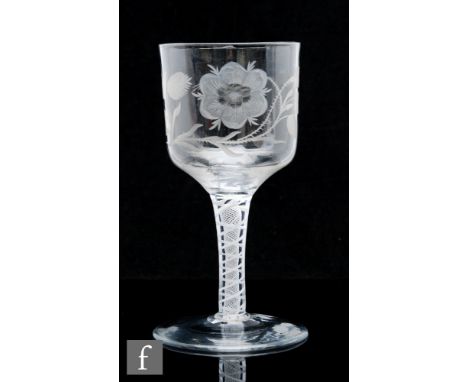 A very large 18th Century Jacobite drinking glass, the ogee bowl engraved with a six petal rose and bud on bough with open wi