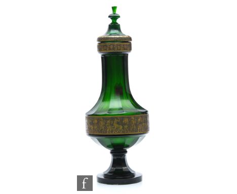 A large early 20th Century Moser Oroplastic crystal glass vase designed by Leo Moser, the circular foot rising to a slice cut
