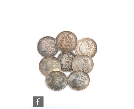 Eight American Morgan dollars, dated 1878, 1892 x 2, 1889 and 1921 x 4. (8) 