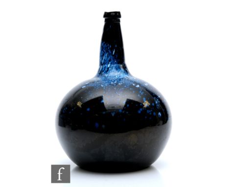 A large Magnum size Nailsea bottle circa 1810, the shouldered ovoid body rising to a tapered collar neck with stepped rim, de