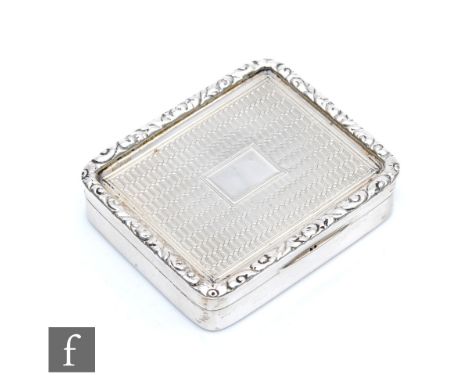 A George VI hallmarked silver rectangular snuff box with engine turned decoration to the cover, length 6cm, weight 68g, Birmi