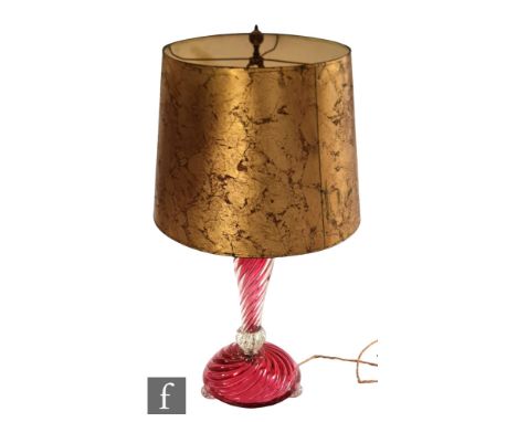 A large mid 20th Century Italian murano glass lamp base in the manner of Seguso, in ruby and clear glass, retains original fi